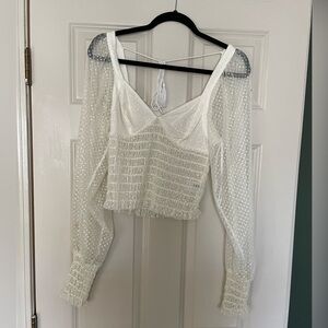 Beautiful white lace blouse with bell sleeves